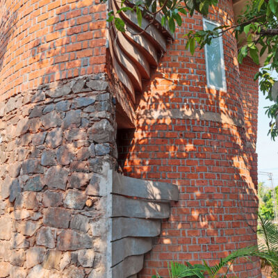 Eco-friendly brick architecture with lush greenery - Farmhouse in Alibag - Sustainable, eco friendly, biophilic architects in Mumbai, India